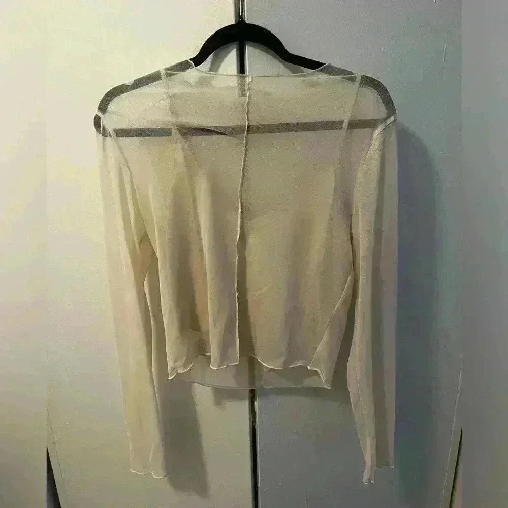Sheer ivory top with built in tank top